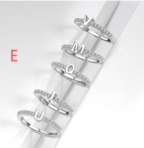 Ring med initialbokstav