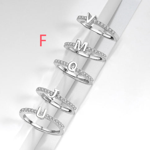 Ring med initialbokstav