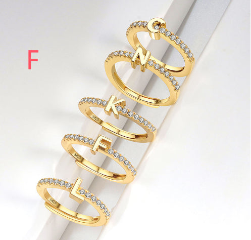 Ring med initialbokstav