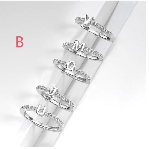 Ring med initialbokstav