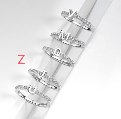 Ring med initialbokstav