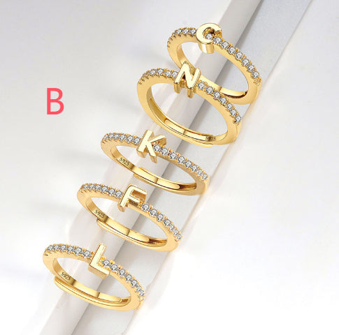 Ring med initialbokstav