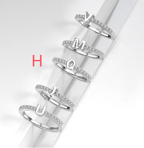 Ring med initialbokstav