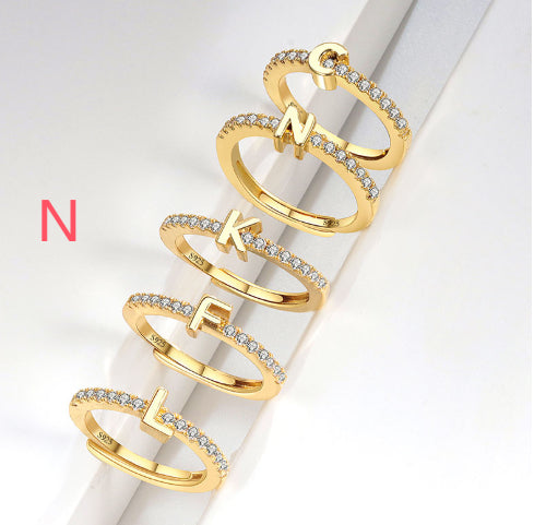 Ring med initialbokstav