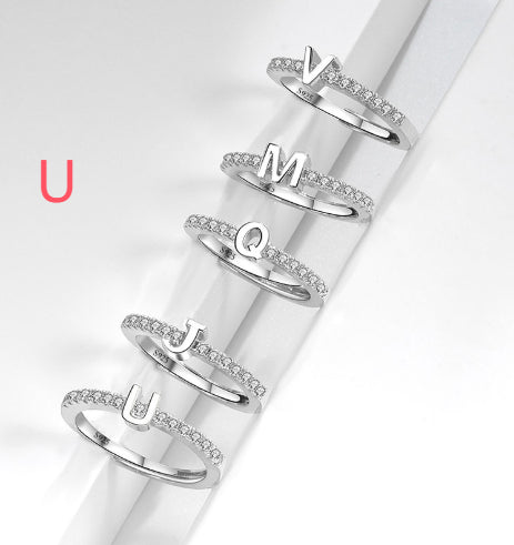 Ring med initialbokstav