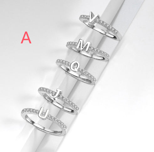 Ring med initialbokstav