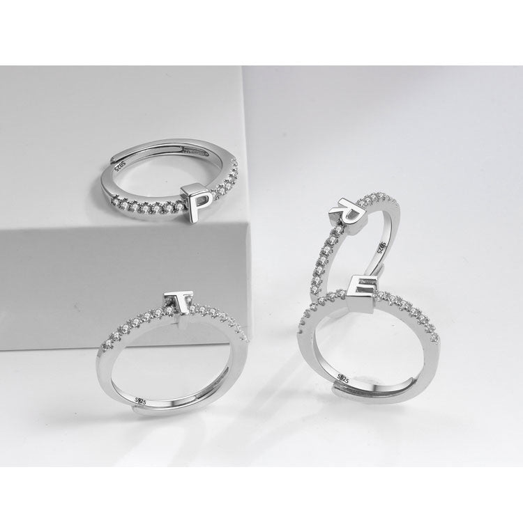 Ring med initialbokstav