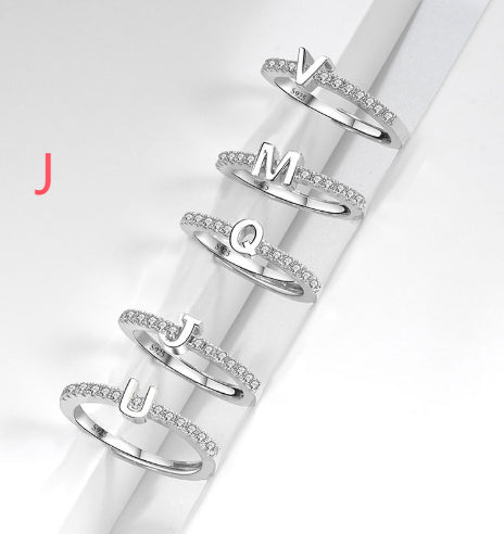 Ring med initialbokstav