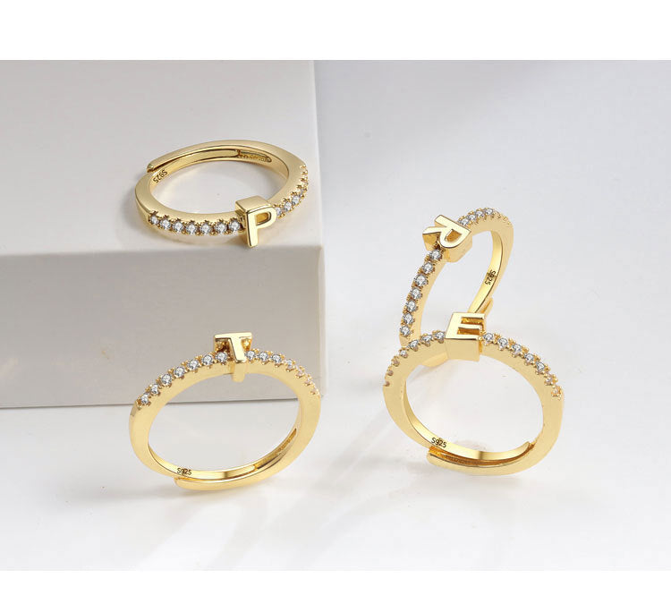 Ring med initialbokstav